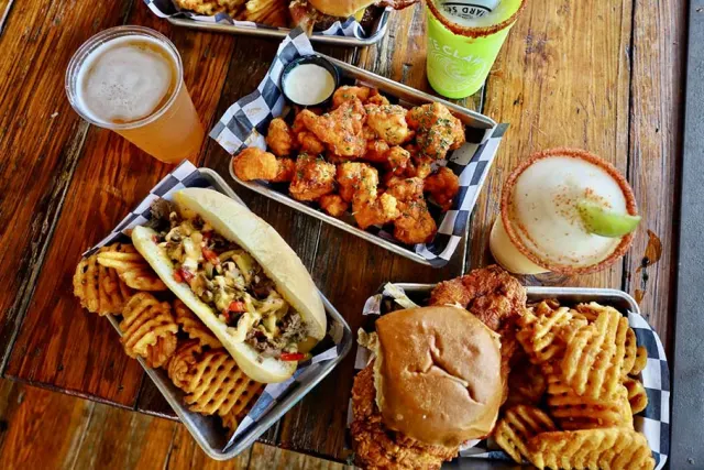 Overhead view of food spread including drinks