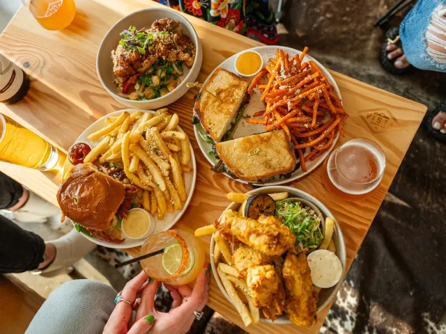 Food spread with drinks on table