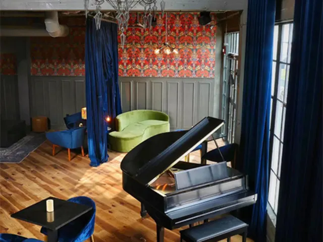 Piano with blue chair