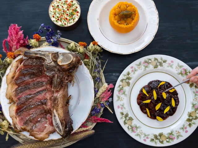 Overhead view of meats and dishes