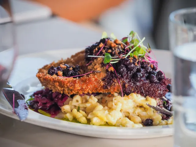 playe of fried item over pasta