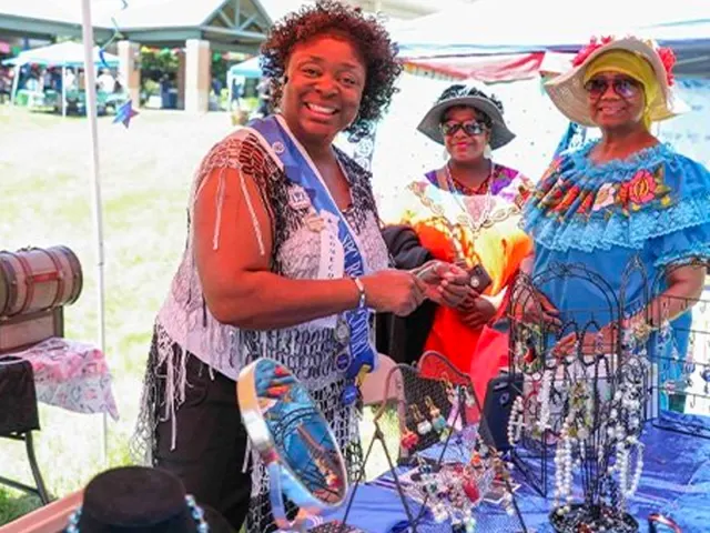 three women selling jewelry