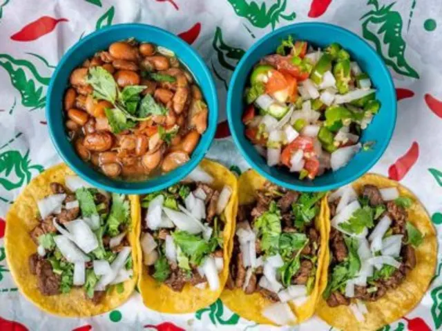 Overhead view of tacos and beans