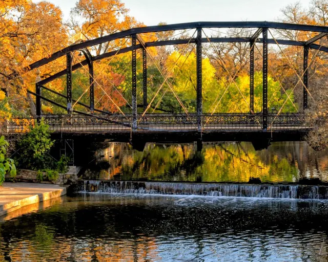Bridge with foliage at Brackeridge Park in San Antonio.
