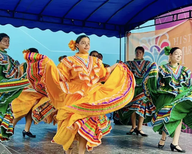 Folklorico dancers in Day of the Dead makeup