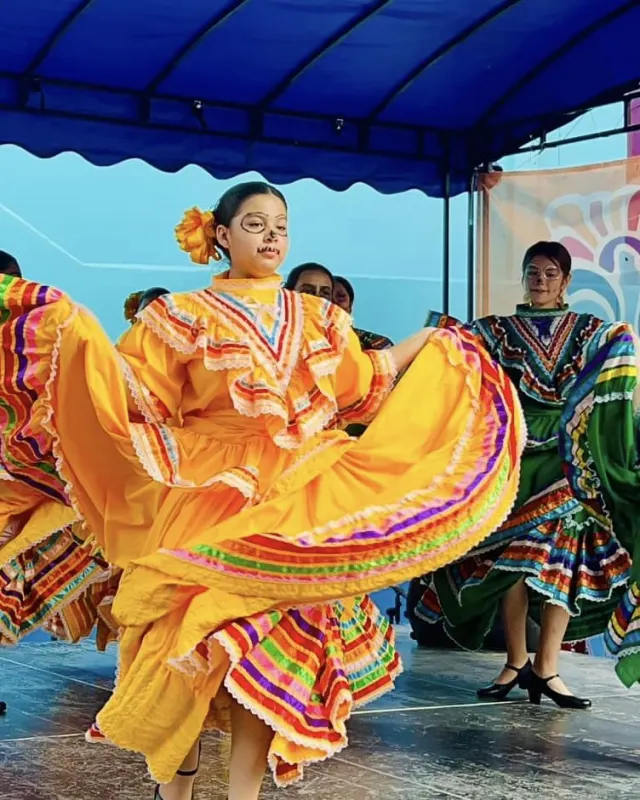 Folklorico dancers in Day of the Dead makeup