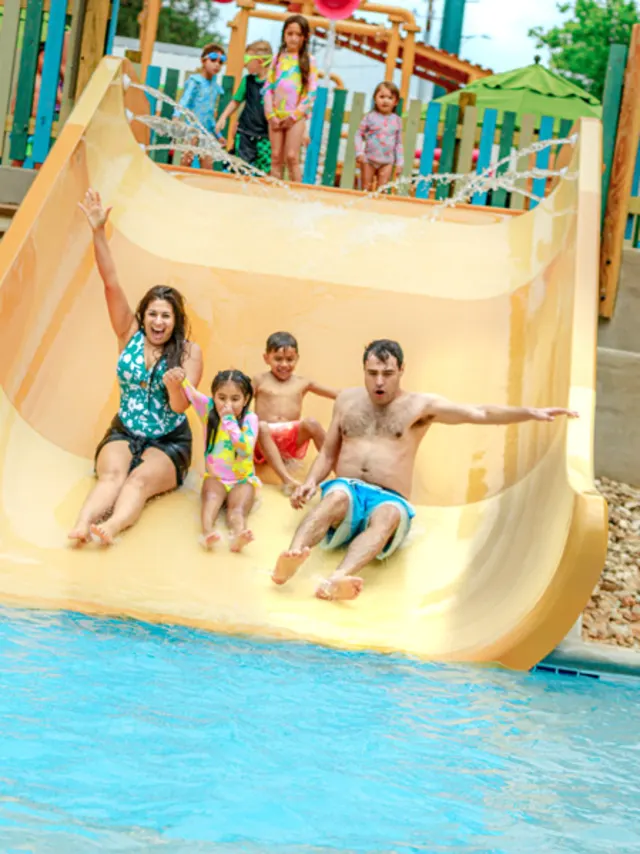 Family on waterslide at Schlitterbahn.