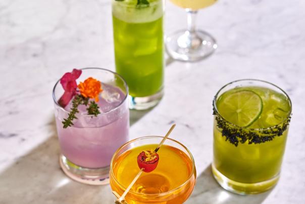 Assortment of cocktail drinks on table
