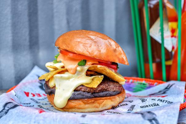 Loaded hamburger with melted cheese