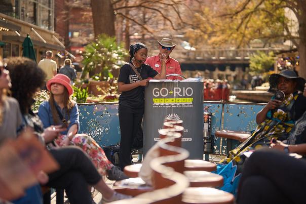 People gathering on Go Rio barge for Black History River Cruise