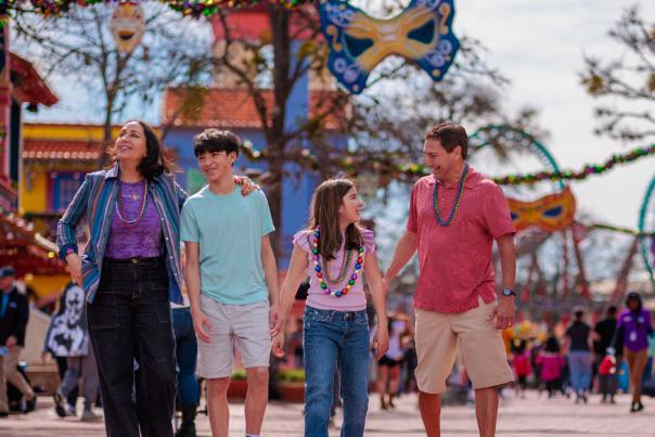 Family with teens at Six Flags Fiesta Texas.