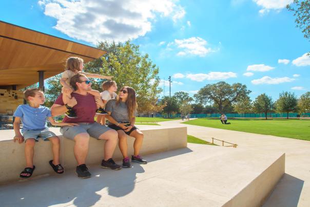 family at park sunny day