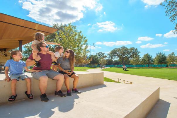 family at park sunny day