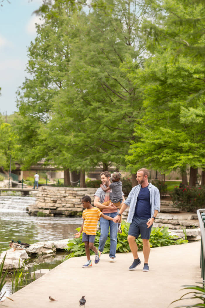 Family strolling through outdoors