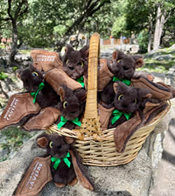 plush bats in basket
