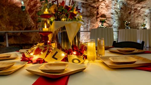Romantic dinner setup inside cavern
