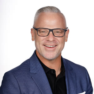 Man in glasses smiling