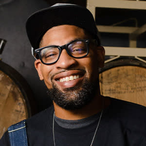 Man smiling with hat on
