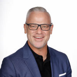 Man in glasses smiling