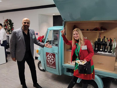 Man and woman in front of novelty van
