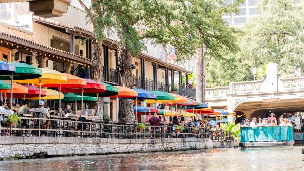 River barge floating by Casa Rio in San Antonio.