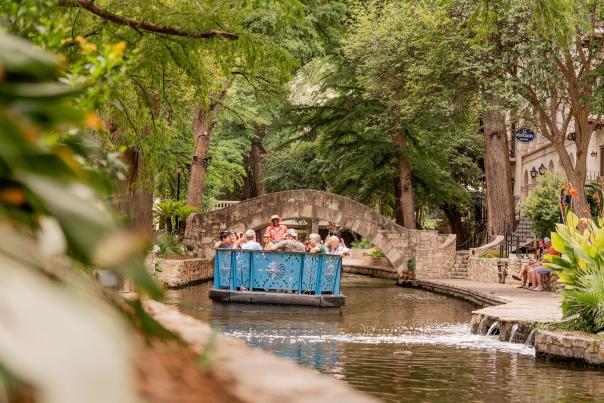 The San Antonio River Walk with a barge