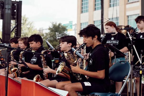 kids playing jazz instruments in a performance