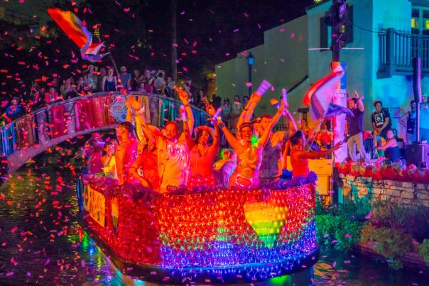 Colorful float at Pride River Parade on San Antonio River Walk