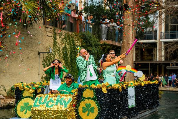 Float at the San Antonio River Walk St. Patrick's parade adorned in Irish decor.