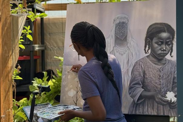 Ismani Sun painting on a canvas