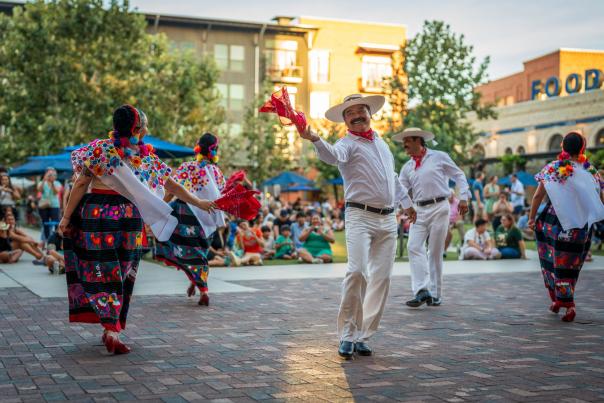 Folklorico dancers outside on patio