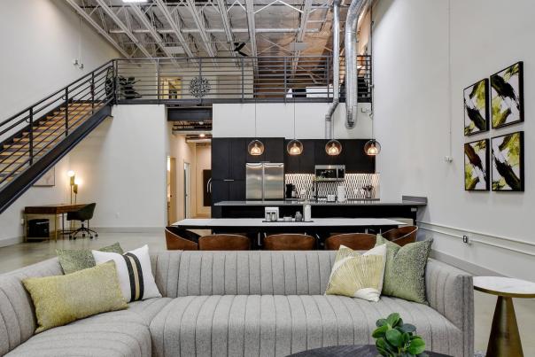 Living room view of rental with staircase