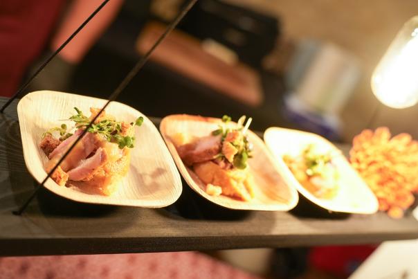 Delicacy food spread with lightbulb in distance