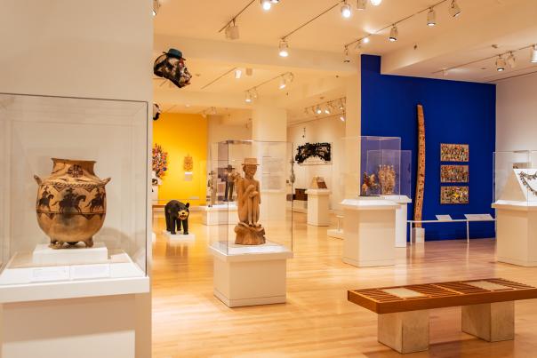 Art gallery room with displays under protective glass