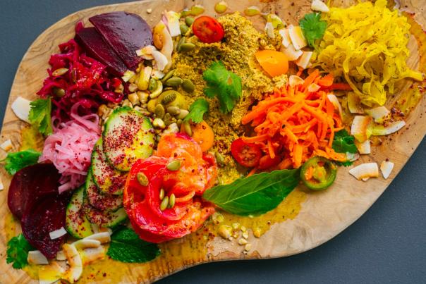 Overhead view of different foods on cutting board