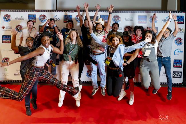 SA Film Festival Attendees Jumping for Photo