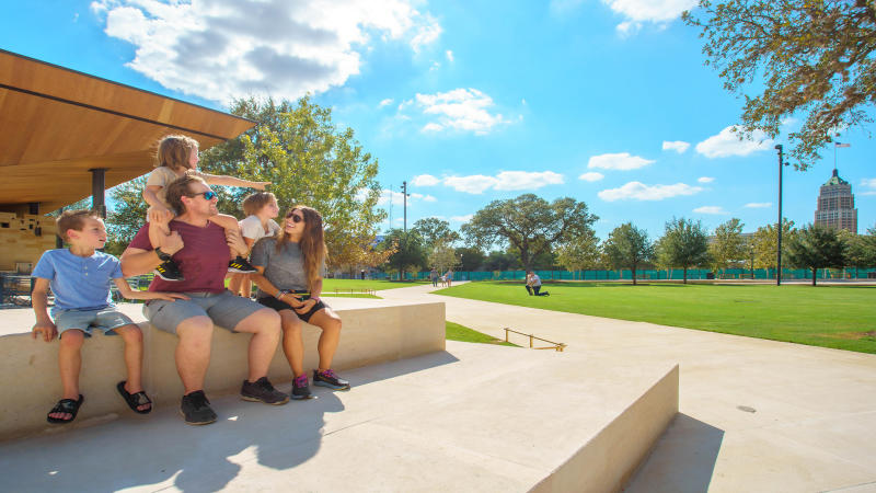 family at park sunny day