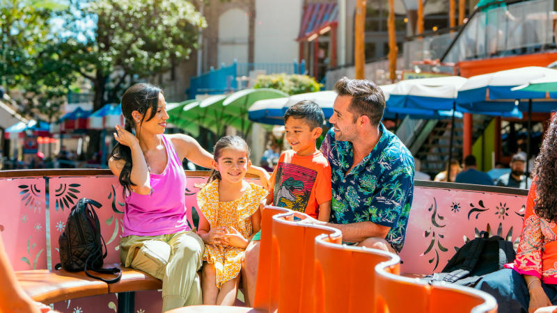Smiling family on a Go Rio River Cruise on the River Walk