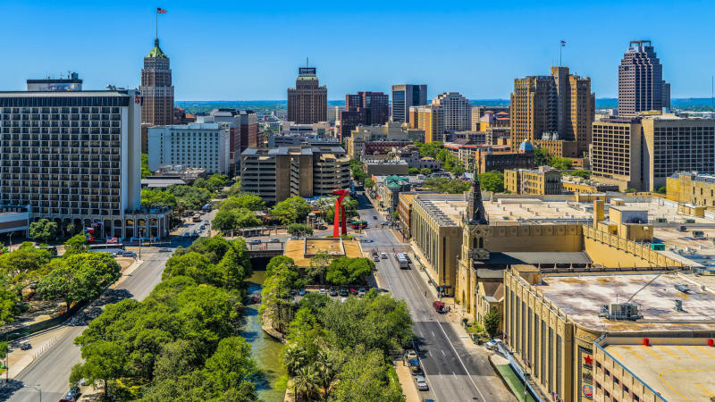 Overhead view of Houston Street in San Antonio with large buildings