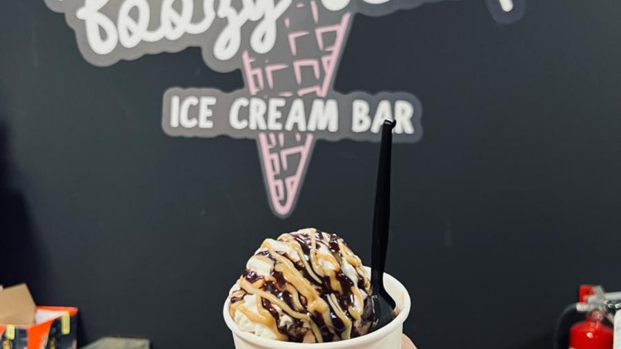 ice cream with sign in the background