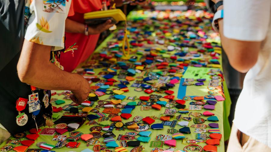 Table full of deocrative medals at Fiesta San Antonio.