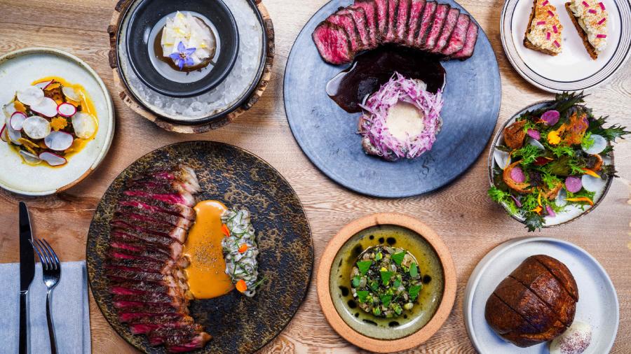 Overhead view of food spread at Isidore at Pullman Market in San Antonio.