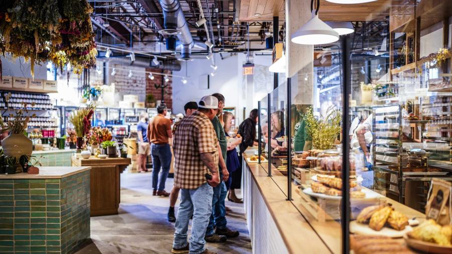 People shopping for culinary needs at Pullman Market in San Antonio.