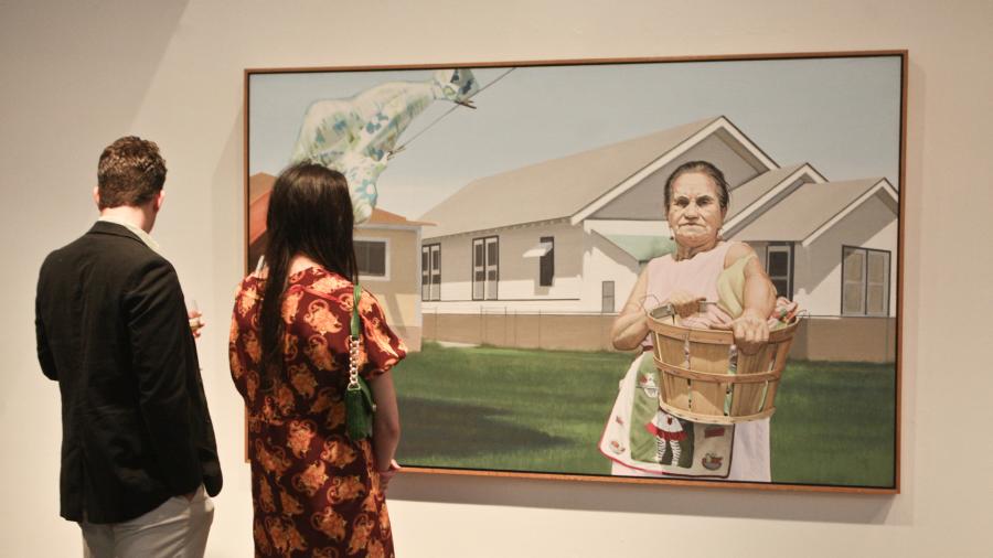 Man and woman viewing painting at San Antonio Museum of Art.