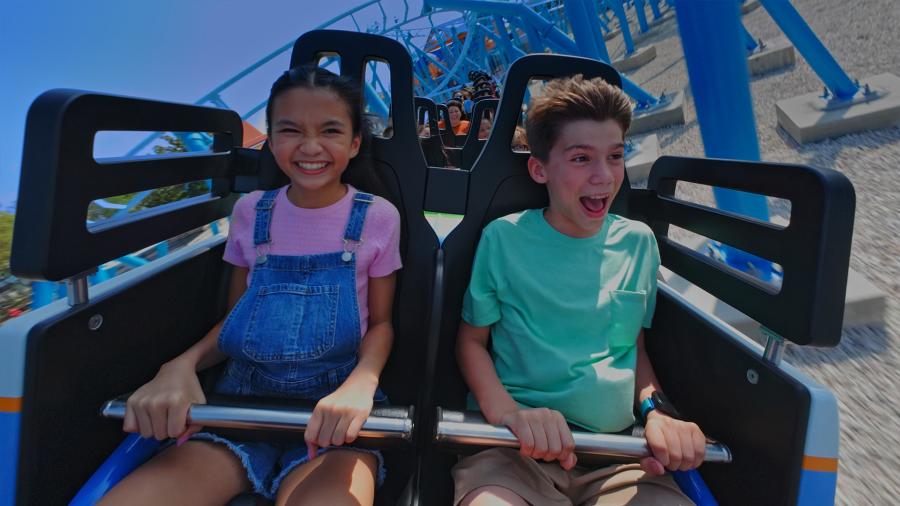 Kids laughing on roller coaster at SeaWorld San Antonio.