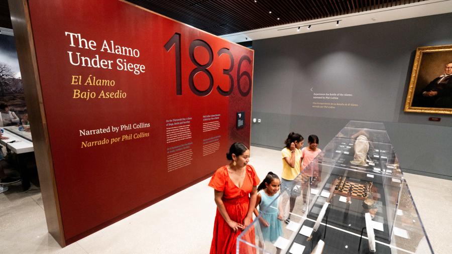 Family viewing exhibit at the Ralston Collection Center at the Alamo in San Antonio.