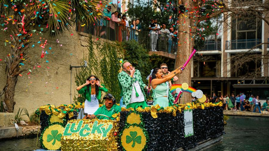 Float at the San Antonio River Walk St. Patrick's parade adorned in Irish decor.