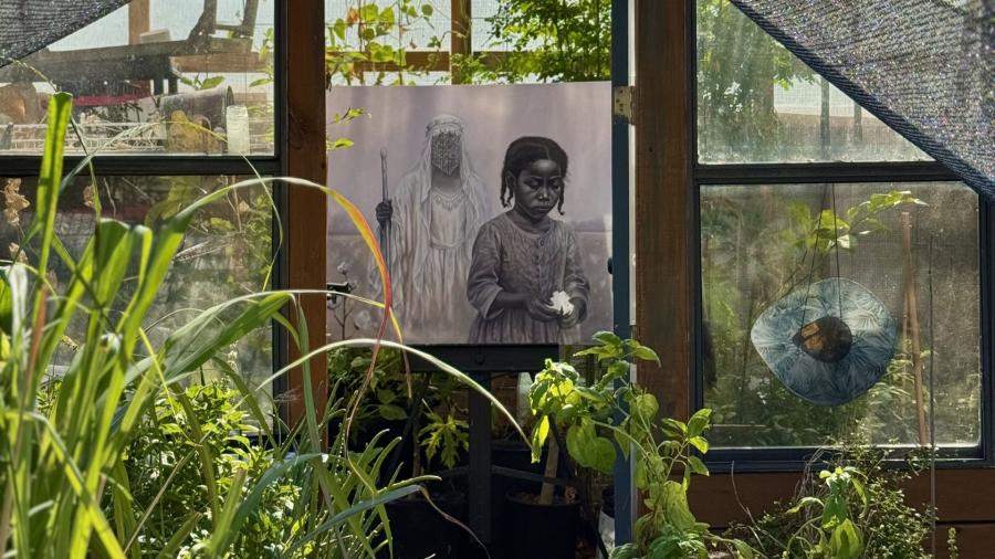 Ismani Sun Art Pieces inside of a greenhouse