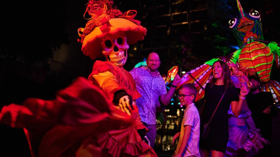 Family dressing with woman dressed in sugar skull attire