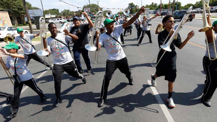 Band members performing in parade